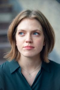 Laura Newey headshot. Photography by Helena Cooke